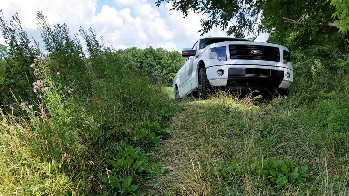 Large wheels and a high ride on the 2014 Ford F-150 Tremor review vehicle make it possible to climb steep hills like this to access good fishing and other off road areas.